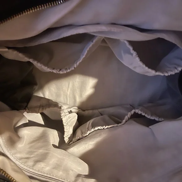 Itzy Ritzy Triple threat diaper bag
